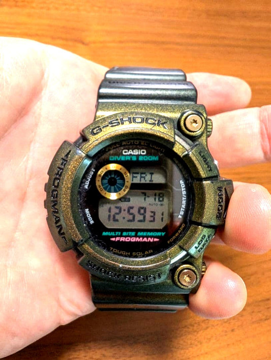 Casio G-Shock Frogman GW-200 diver's watch in black and green with replaced black loop, shown from front