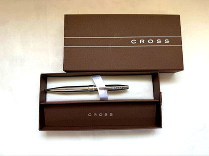 Cross metallic chrome plated ballpoint pen with twist mechanism and metal body