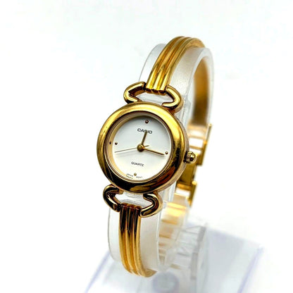Casio LTP-2020 women's quartz watch with gold bracelet and white dial Japan import