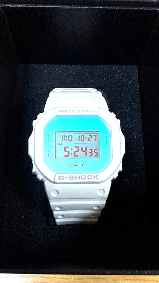 Casio G-Shock Beach Time Lapse Series DW-5600TL-7JF digital watch with gradient glass and black resin band