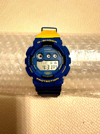 Casio G-Shock GD-120NC2JF digital watch with bold blue and orange color block design and digital display