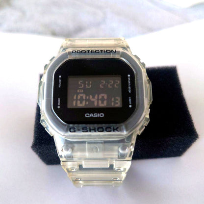 Casio G-Shock DW-5600SKE-7 clear digital watch with LED backlight showing front view