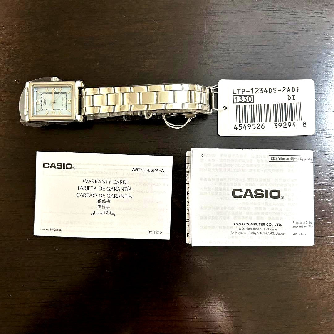 Casio LTP-1234DS-2A Series wristwatch with blue dial and silver band, Japan import