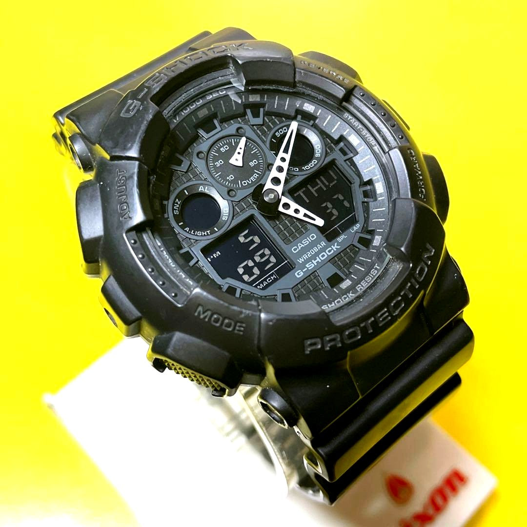Casio G-Shock Analog-Digital Watch with reverse LCD and all-black three-dimensional dial design
