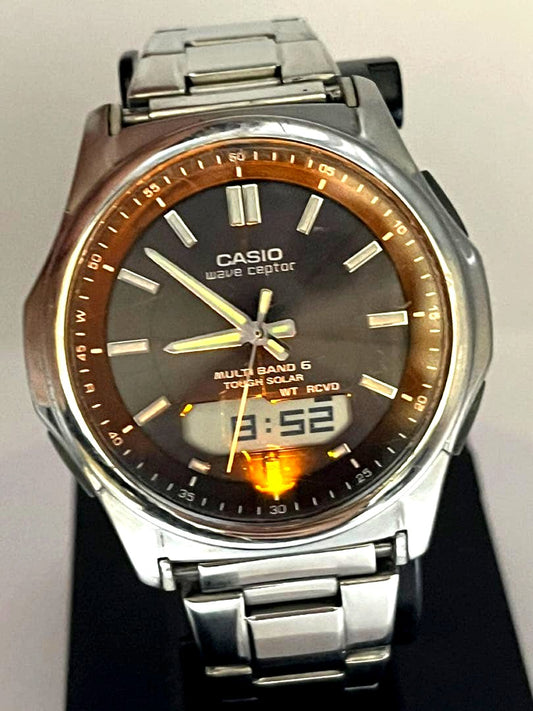 Casio Wave Ceptor Multi Band 6 Solar Watch with silver metal band and black dial digital analog display