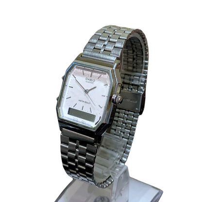 Casio AQ-315 men's digital analog watch showing moving parts and adjustable strap on wrist