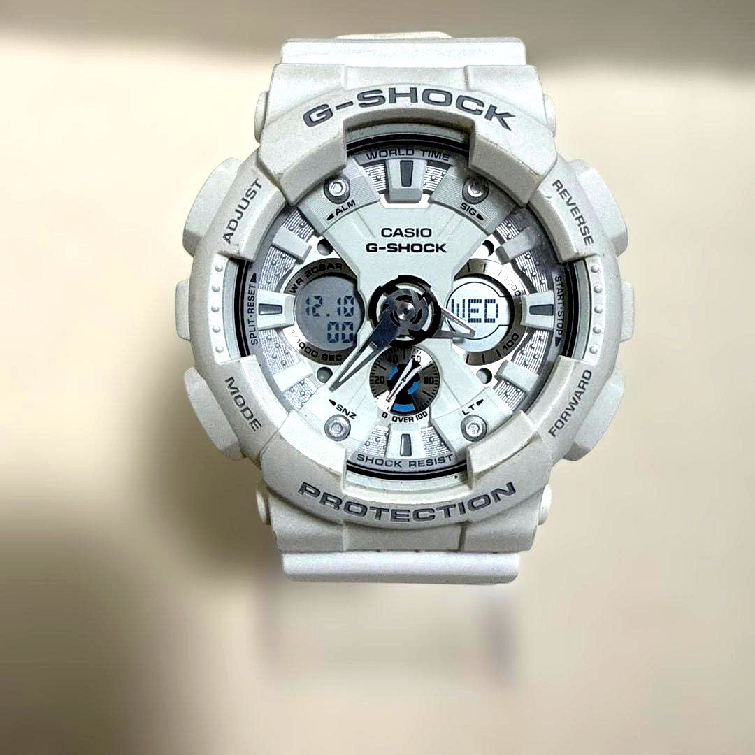 Casio G-Shock GA-120A-7AJF white digital watch with shock resistance and multifunction features