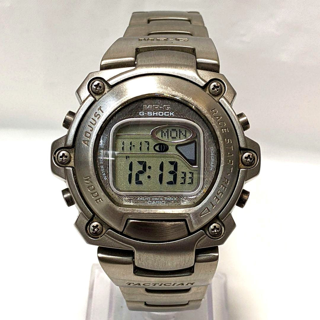 Casio G-Shock MRG-1000T silver digital watch with titanium band showing front view