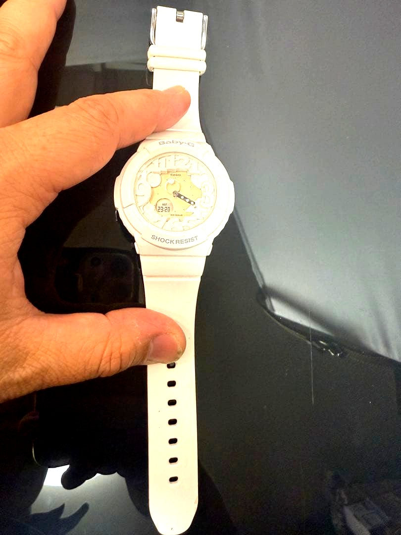 Casio Baby-G BGA-131-7BJF white watch with large case and glowing neon dial illuminated by built-in blacklight