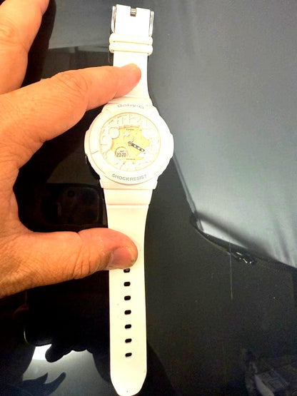 Casio Baby-G BGA-131-7BJF white watch with large case and glowing neon dial illuminated by built-in blacklight
