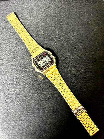 Casio A159W digital wristwatch with gold finish showing time and date on display