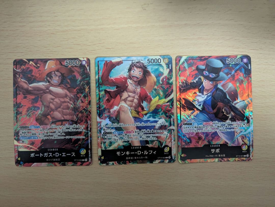 One Piece Card Game OP05 SR Japanese set featuring Monkey D Luffy, Portgas D Ace, and Sabo cards
