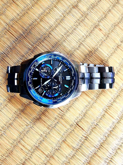 Casio Oceanus OCW-S1400-1AJF radio controlled watch with black dial, blue accents, and titanium band