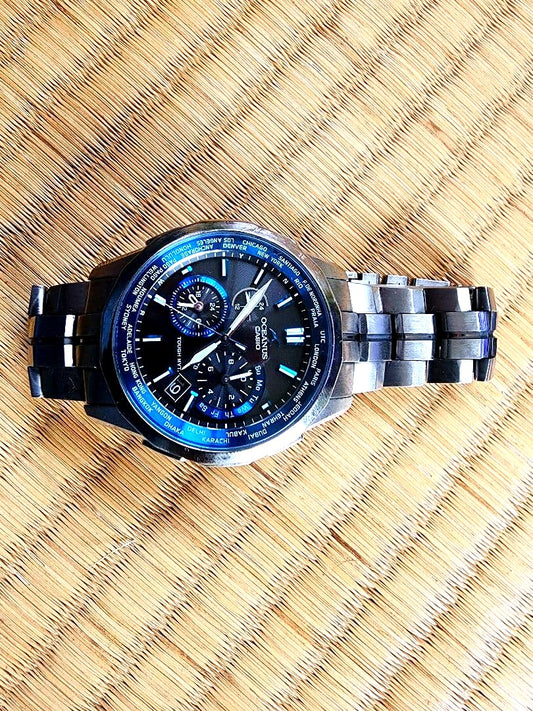 Casio Oceanus OCW-S1400-1AJF radio controlled watch with black dial, blue accents, and titanium band