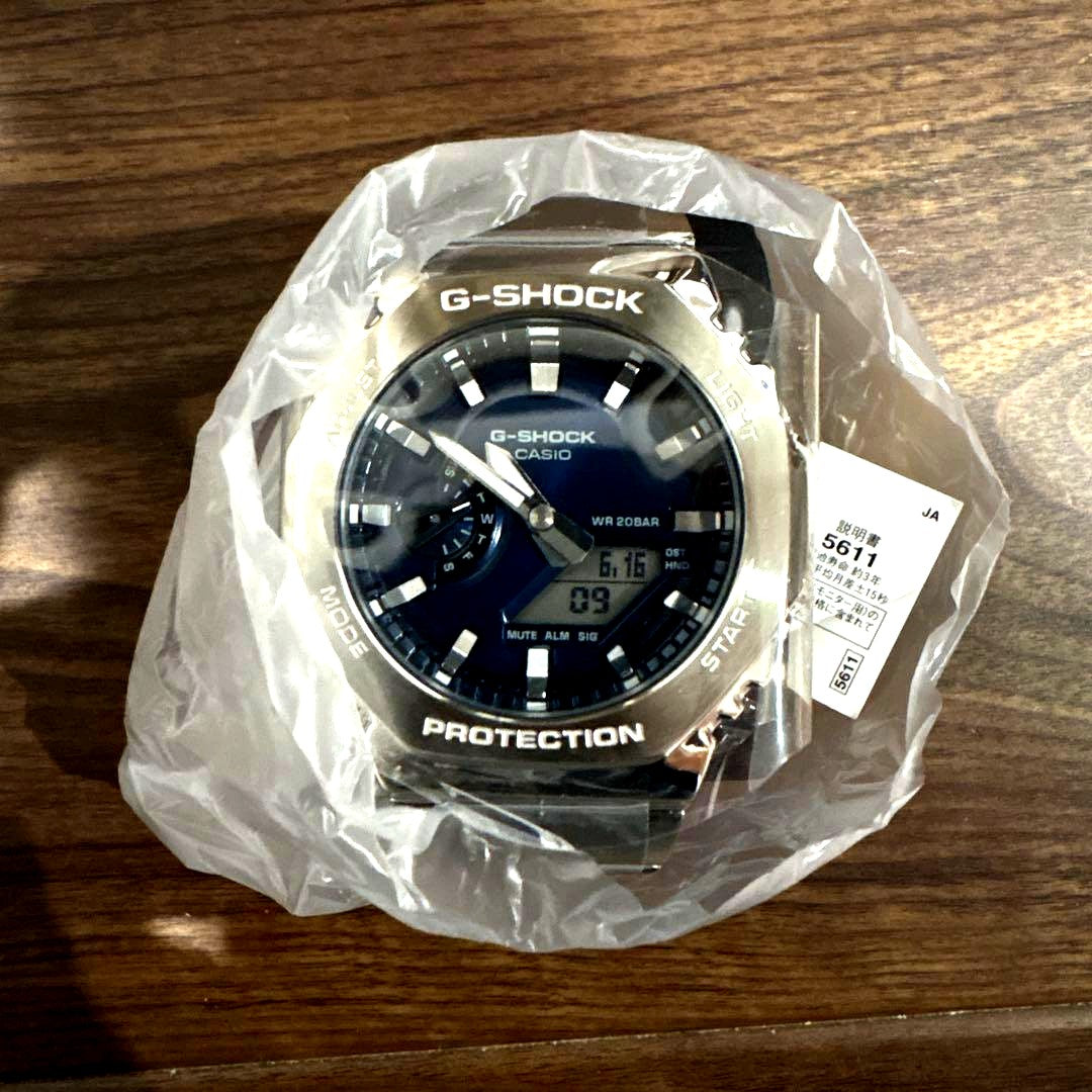 Casio G-Shock GM-2110D-2BJF watch with metal bezel and digital-analog display