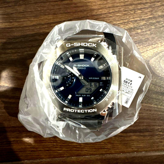 Casio G-Shock GM-2110D-2BJF watch with metal bezel and digital-analog display