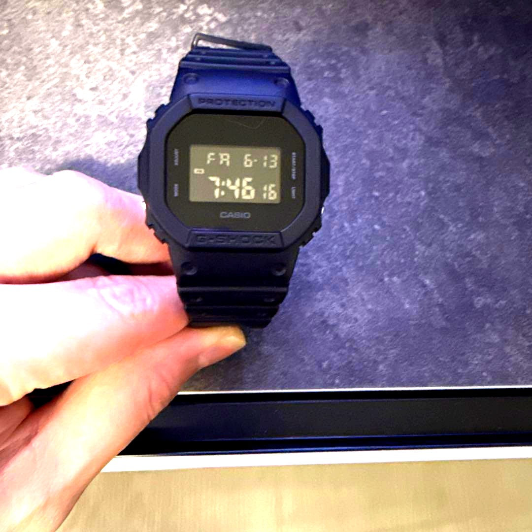 Casio G-Shock black watch with neon green illumination, used condition, Japan import