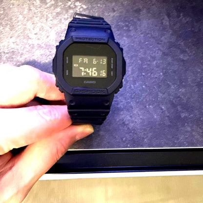 Casio G-Shock black watch with neon green illumination, used condition, Japan import