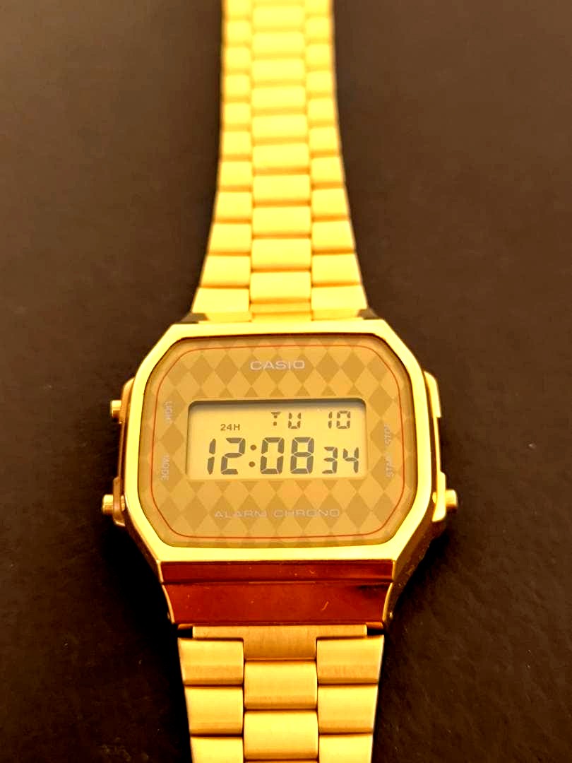 Casio Digital Watch A168 in gold color with digital display, Japan import, used excellent condition