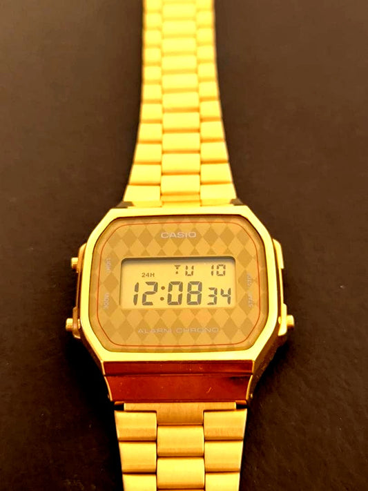 Casio Digital Watch A168 in gold color with digital display, Japan import, used excellent condition