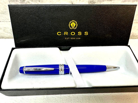 Used CROSS ballpoint pen with blue body, silver accents, and dedicated case