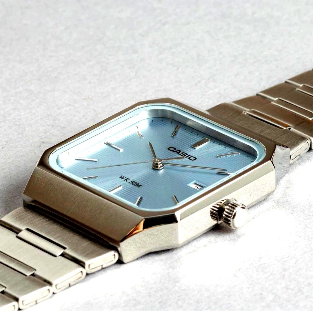 Casio MTP-B185D-2A2V wristwatch with blue dial and silver metal strap in original box