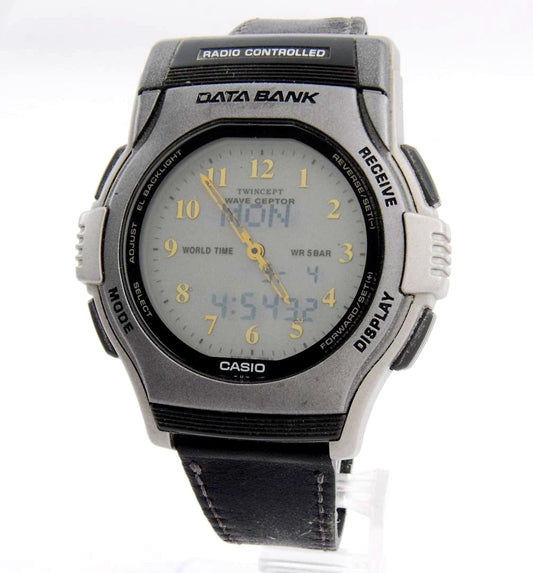 Casio Data Bank Twincept FKT-2000 silver radio-controlled watch with analog and digital display on a leather strap