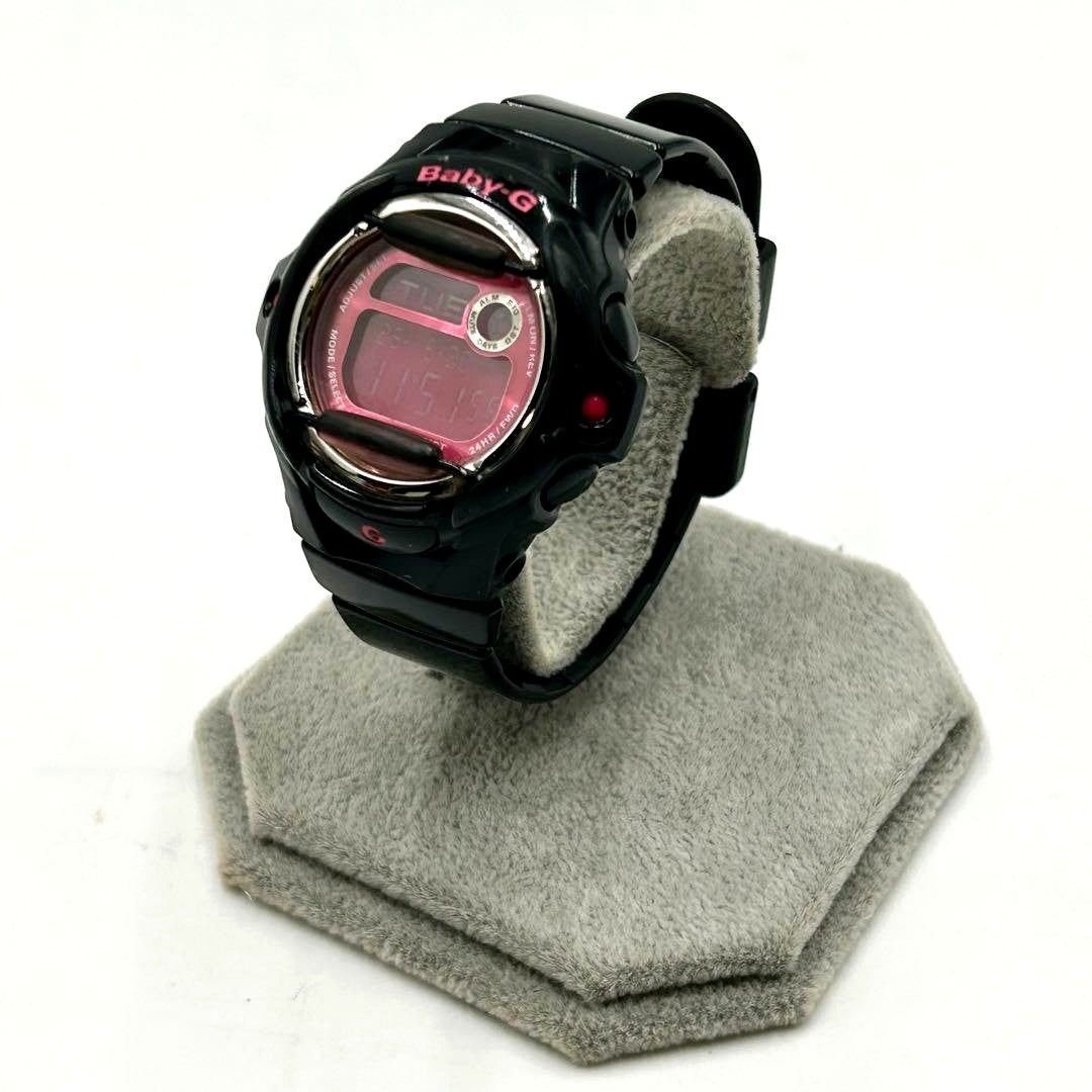 Casio Baby-G BG-169R black and pink women's wristwatch showing minor wear and scratches