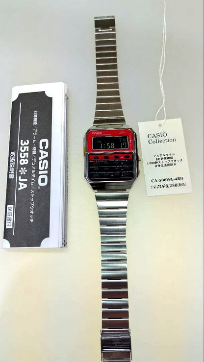 Silver Casio CA-500WE-4BJF digital watch with calculator, stopwatch, alarm, and dual time display