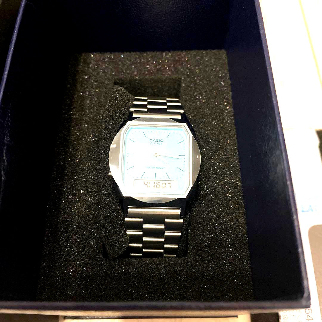 Casio AQ-230A-2MQUIJF watch in Tiffany Blue with digital and analog display, brand new