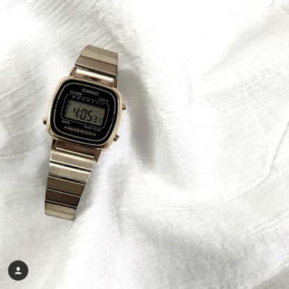 Casio Gold LA670W digital wristwatch with gold-tone stainless steel band and classic retro design