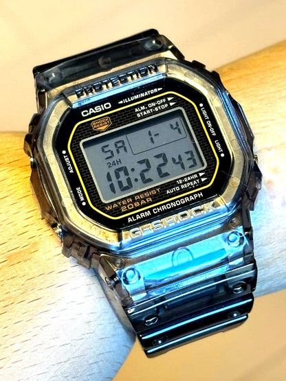 Casio G-Shock DW-5025 limited edition 25th anniversary gold skeleton watch with used condition