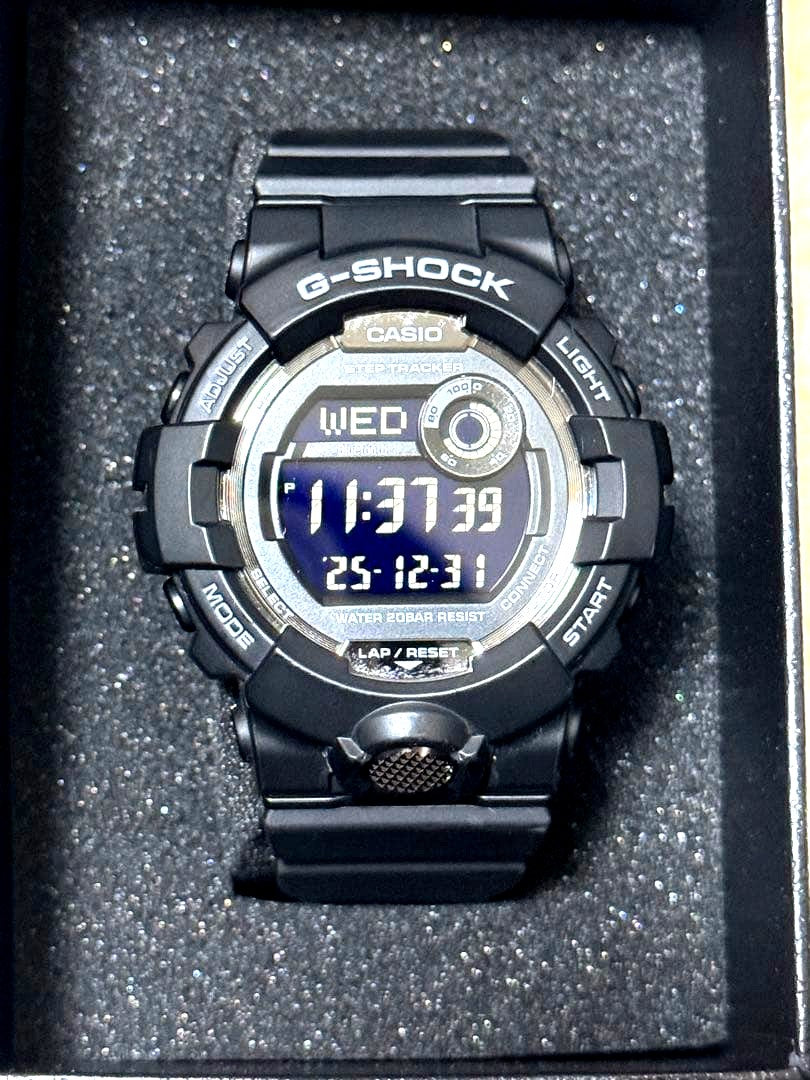 Black Casio G-Shock digital watch with step tracker and 200 meters water resistance