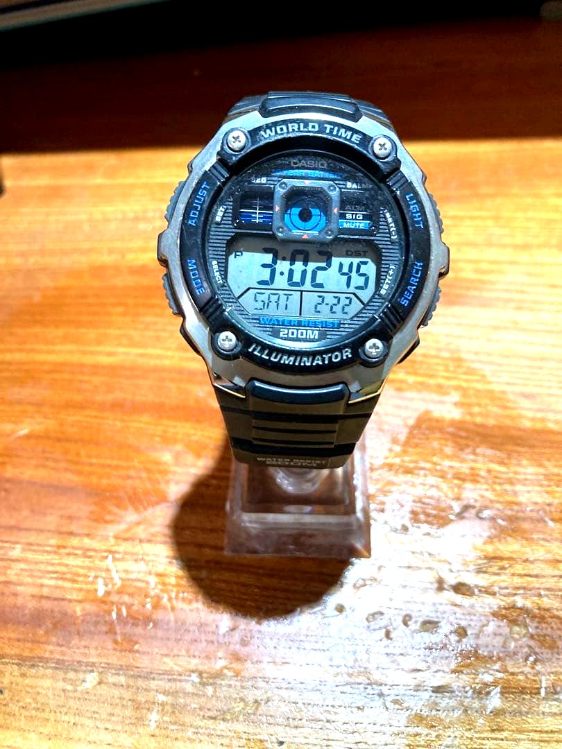 Casio AE-2000W black world time watch with rubber band and digital display