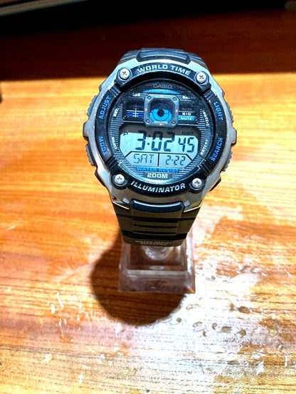 Casio AE-2000W black world time watch with rubber band and digital display
