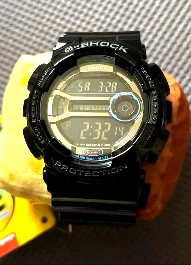 Casio G-Shock GD-110 digital watch in black and blue with shock resistance features