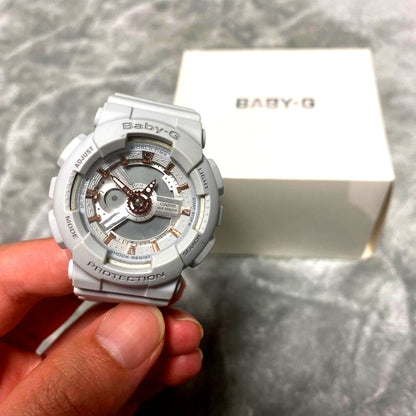 Casio Baby-G 5338 BA-110 wristwatch in grey pink gold with visible discoloration and minor dirt
