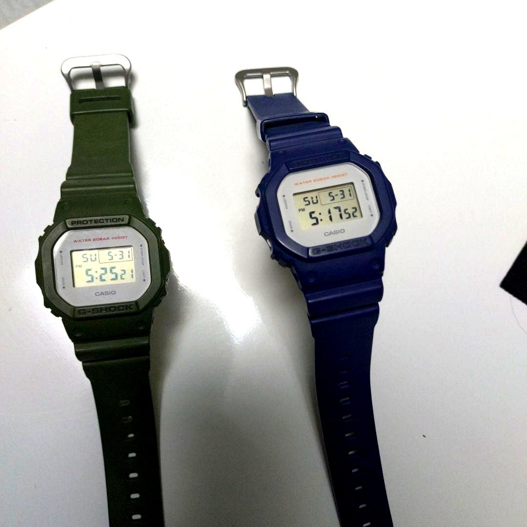 Casio G-Shock DW-5600M two-piece digital watch set with shock-resistant square design and black bands