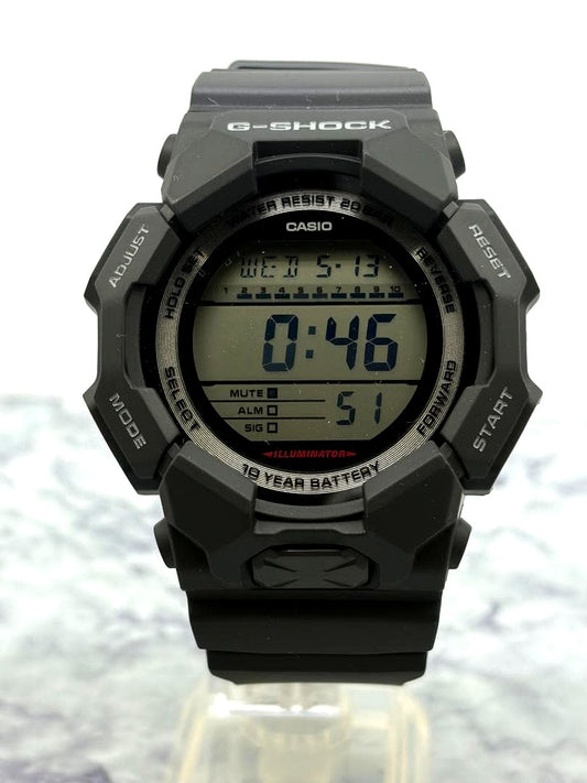 Casio G-Shock GD-010 digital watch with carbon core design and silicone strap shown with original box and manual