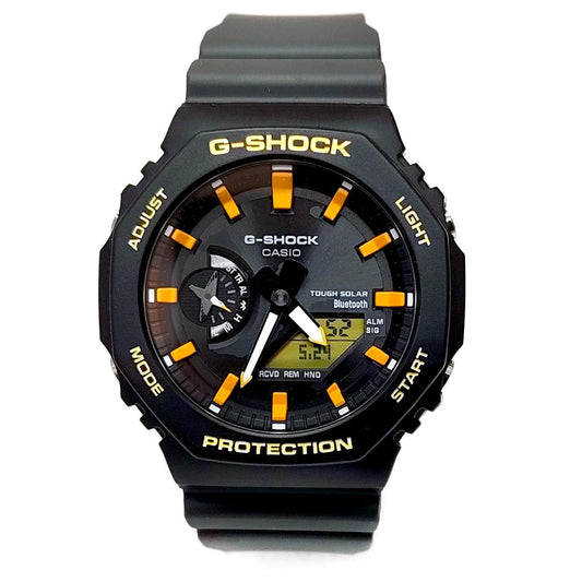 Casio G-Shock GA-B2100DF-1AJR watch with black resin band and carbon core case, showing digital-analog display