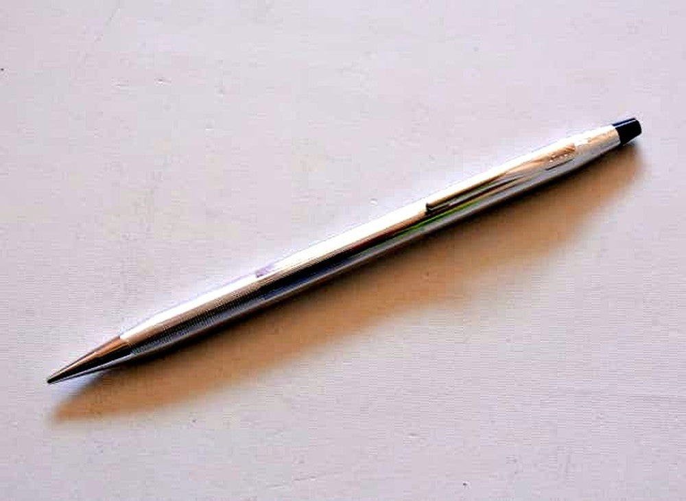Cross brand mechanical pencil with old logo and chrome metal body made in USA
