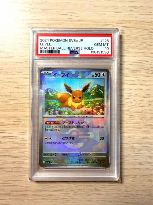 Eevee Pokémon trading card graded PSA 10 with minor scratches in protective case from Japan import