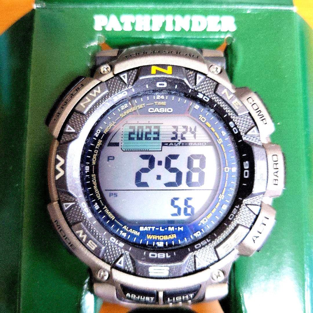 Casio Pro Trek PRG-240T-7 Tactic solar watch with black and silver design showing digital display and buttons