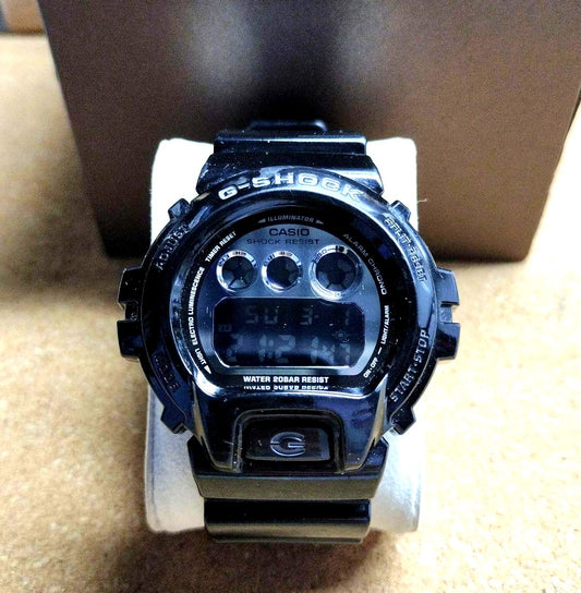 Casio G-Shock DW-6900NB watch with silver dial and black band Japan import