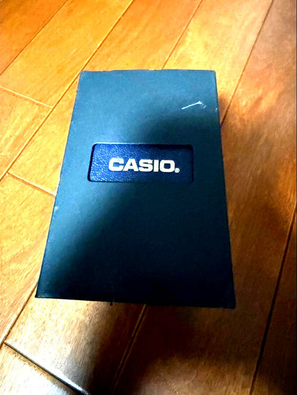 Casio Data Bank Watch Model 5444 5524 with metal band and LCD display showing Japan import
