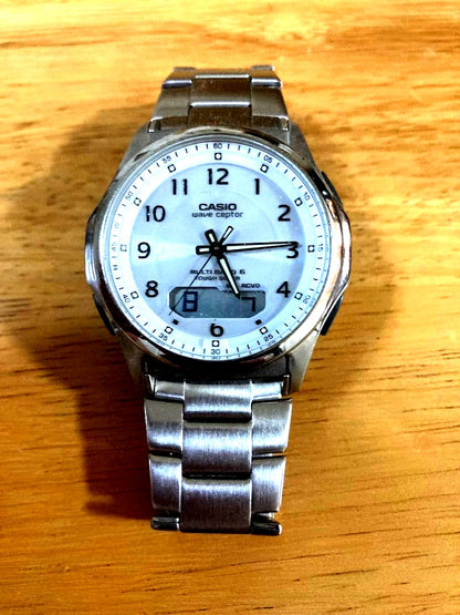 Casio Wave Ceptor Multi Band 6 Tough Solar analog digital watch with stainless steel body and white dial