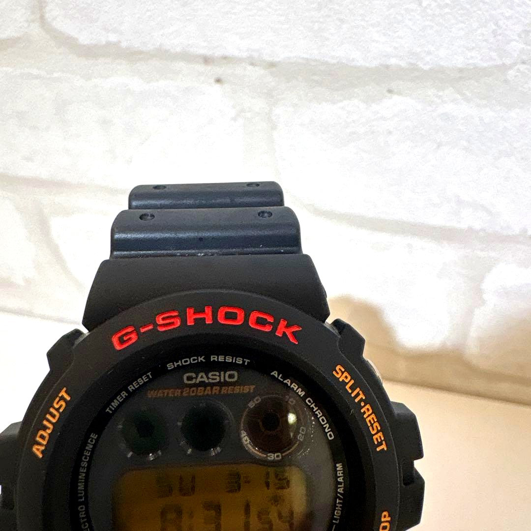Casio G-Shock DW-6900 Foxfire 1995 men's watch with black rubber band and digital display