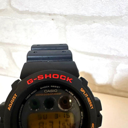 Casio G-Shock DW-6900 Foxfire 1995 men's watch with black rubber band and digital display