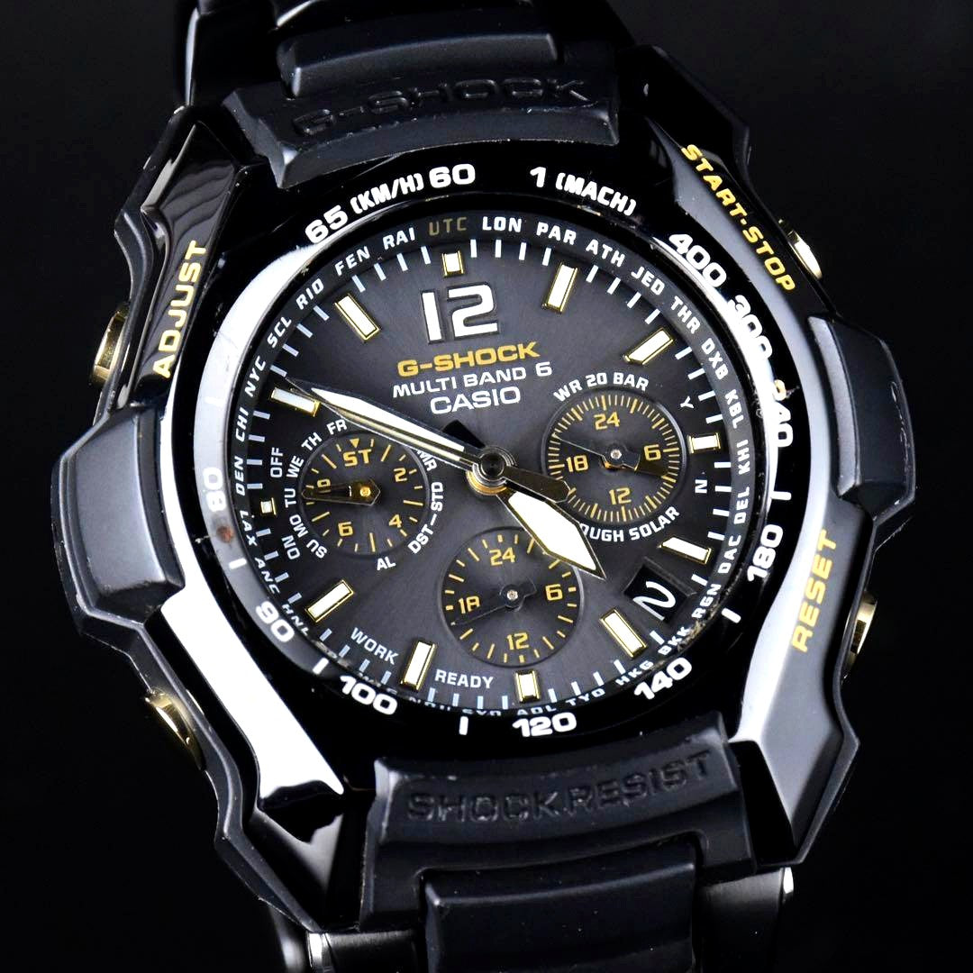 Casio G-Shock Gravitymaster GW-2000BGD-1AJF black and gold watch with metal band and curved glass