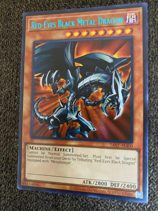 Seiko Red Eyes Black Metal Dragon 25th Anniversary English Blue collectible card with red, black, and blue colors